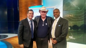 Weather Geeks hosts Chris Warren (left) and Dr. Marshall Shepard (right) pose with the show's first guest, Dr. Charles Doswell (center) on the Weather Geeks set.